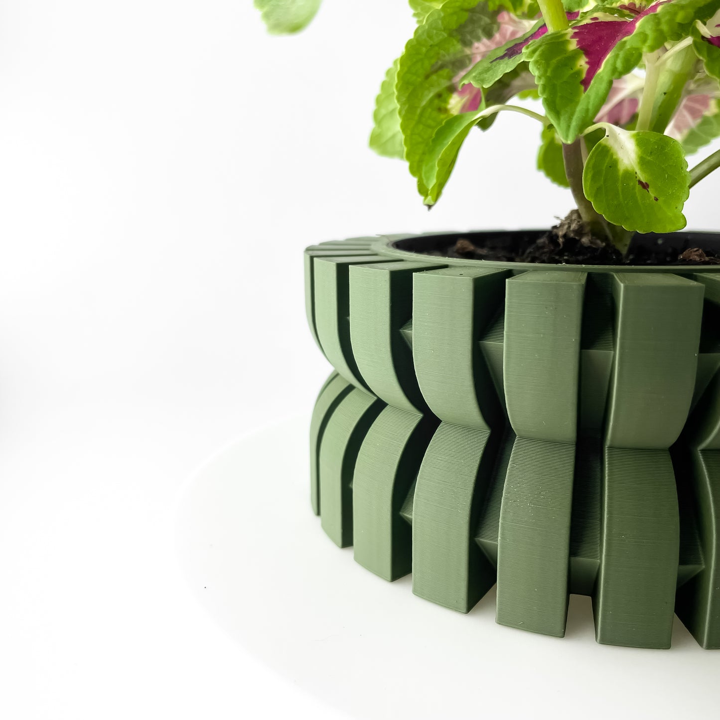 The Griva Interior Planter Pot with Drainage Tray