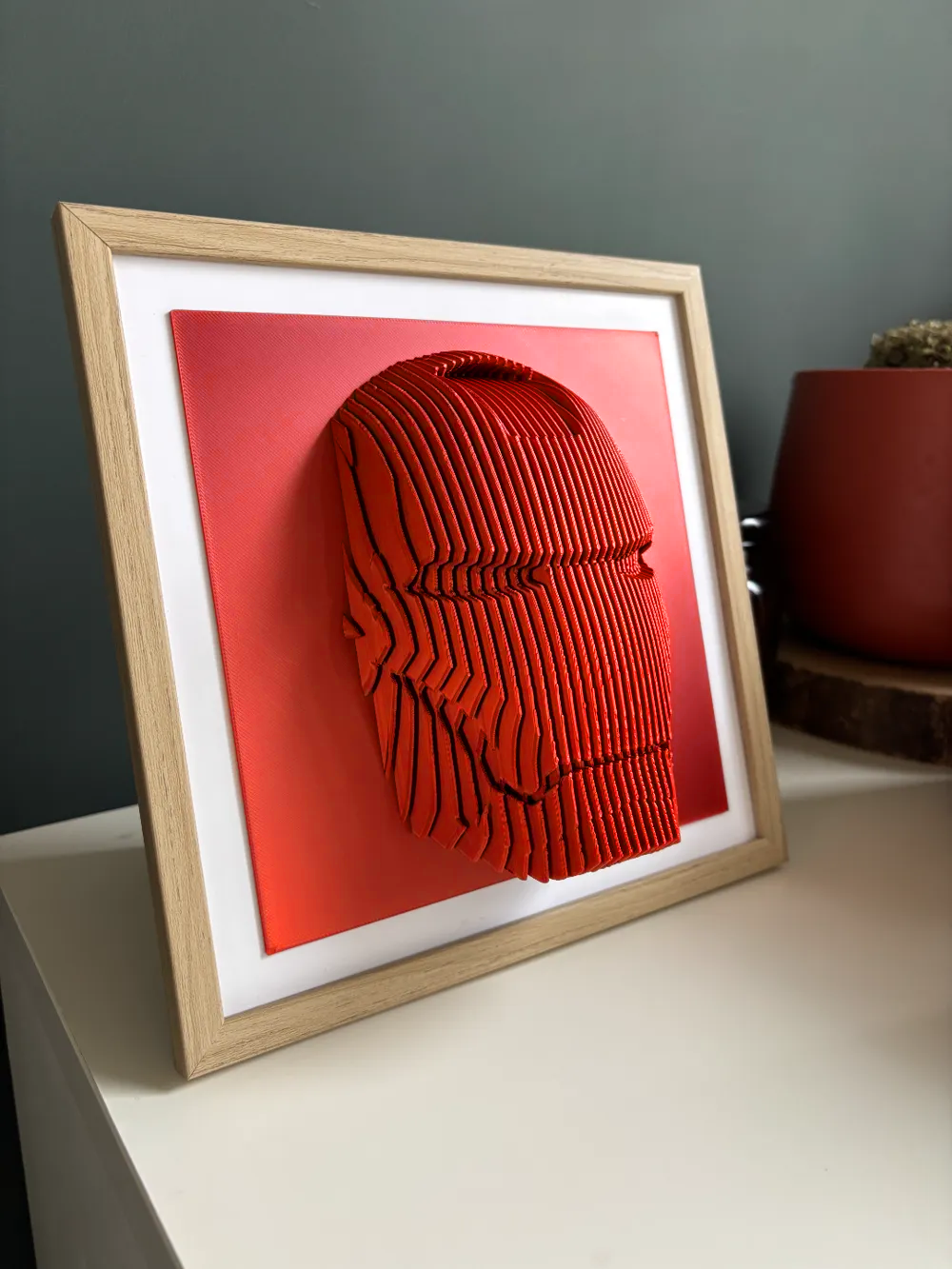 Ironman helmet layered sculpture